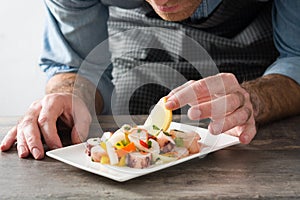 Chef preparing seafood ceviche