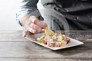 Chef preparing seafood ceviche