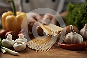 Chef preparing spaghetti