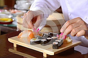 chef preparing sushi