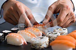 Chef preparing sushi photo