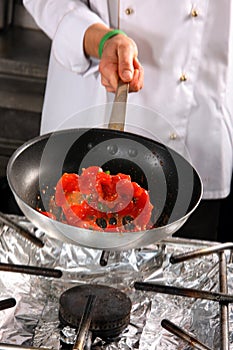 Chef preparing tomato