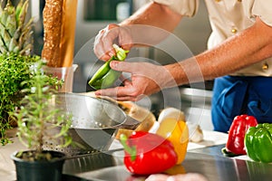 Chef preparing vegetables photo