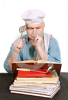 Chef with recipe book.