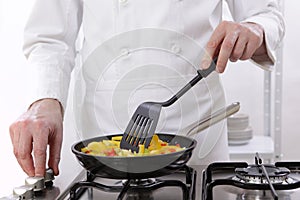 Chef roasting vegetables