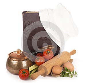 Chef's hat with battledore and cook book