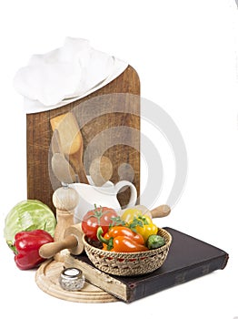 Chef's hat with battledore and cook book