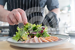 The chef serves roast duck.
