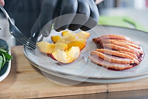 The chef serves roast duck.