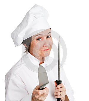 Chef Sharpens Kitchen Knife