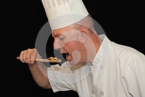 Chef tasting food