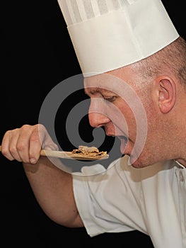 Chef tasting food