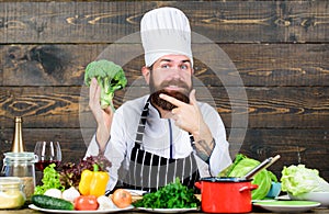 Chef use fresh organic vegetables for dish. Vegetarian meal. Organic food. Fresh ingredients only. Culinary recipe