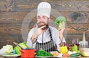 Chef use fresh organic vegetables for dish. Vegetarian meal. Organic food. Fresh ingredients only. Culinary recipe