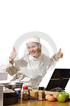 Chef using computer with thumbs up