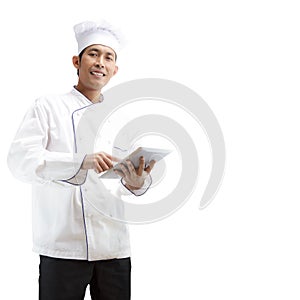 Chef using digital tablet