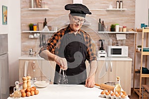 Chef wearing bonete and apron photo