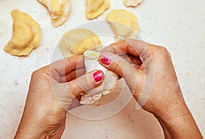 Chef who prepares dumplings from dough