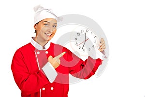 Chef woman indicate to clock photo