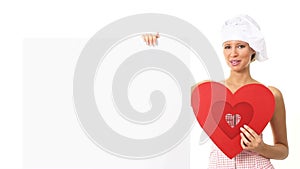 Chef woman showing sign with heart shape