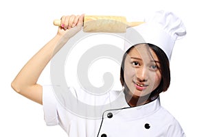 Chef woman smiling happy holding baking rolling pin