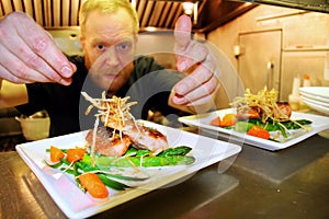 Chef at work in small kitchen