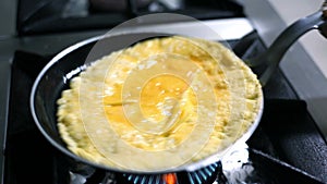 Cheff Preparing Omelette in Pan