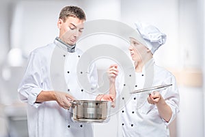 chefs emotions regarding foul soup in a pan, a portrait against the background