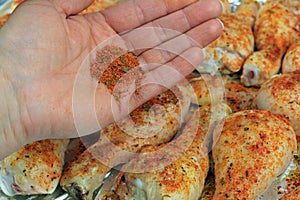 A Chefs Hand Seasoning Chicken