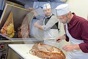 Chefs preparing boiled food