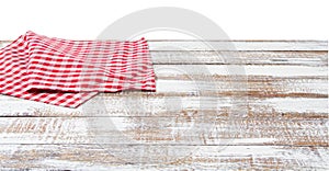 Chekered tablecloth on empty table isolated on white background copy space