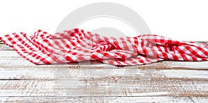 Chekered tablecloth on empty table isolated on white background copy space