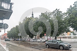 City center of Chelmno during rain