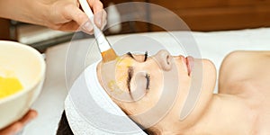 Chemic facial and body peel. Cosmetology acne treatment. Young girl at medical spa salon