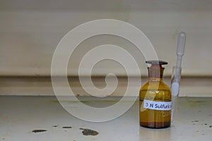 The chemical bottle in laboratory