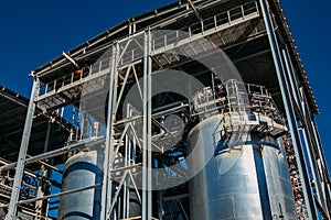 Chemical factory. Elastomer and thermoplastic production line. Large tanks for preparing monomers and polymerization
