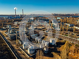 Chemical factory industrial area. Aerial view. Large vats connected by pipeline