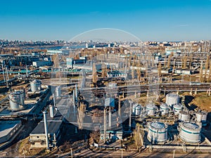 Chemical factory industrial area. Aerial view. Large vats connected by pipeline