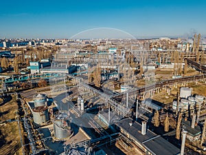 Chemical factory industrial area. Aerial view. Large vats connected by pipeline