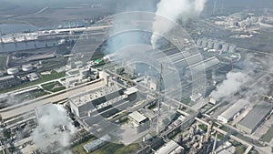 Chemical factory with smoke. Chemical plant. Industrial power plant with smokestack