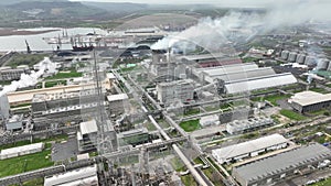 Chemical factory with smoke. Chemical plant. Industrial power plant with smokestack