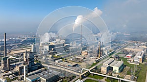 Chemical factory with smoke. Chemical plant. Industrial power plant with smokestack