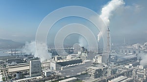 Chemical factory with smoke. Industrial power plant with smokestack