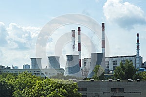 Chemical factory with smoke stack. Smoke emission from factory pipes. Ecology and environmental protection problems, air pollution