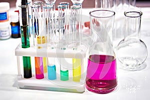 Chemical flasks and test tubes with solutions