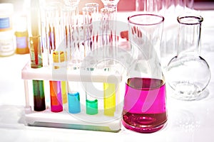 Chemical flasks and test tubes with solutions