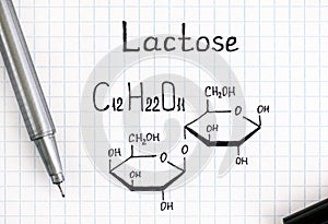 Chemical formula of Lactose with black pen.