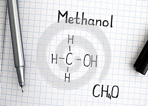 Chemical formula of Methanol with black pen.