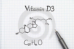 Chemical formula of Vitamin D3 with pen.