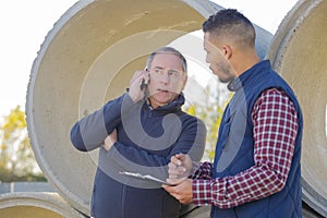 Chemical industrial engineer on phone